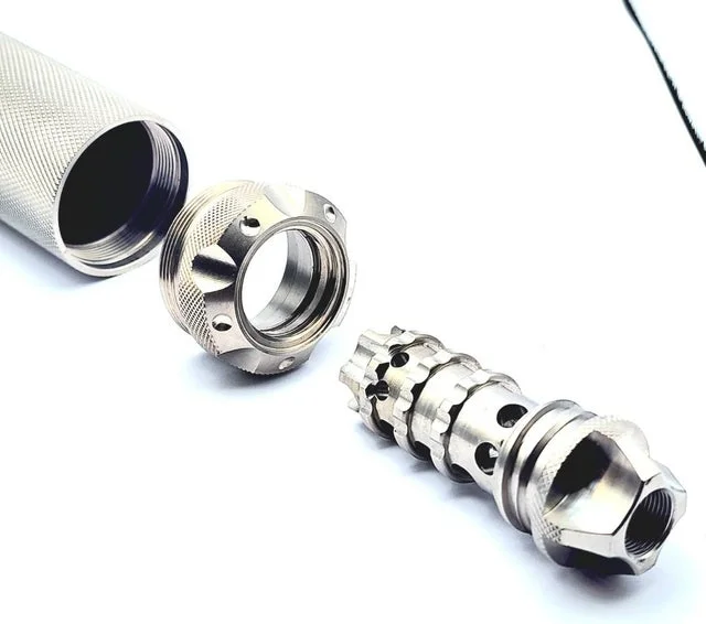 Titanium D Size Barrel Adapter 1/2x28 maglite adapter — storage cups for AR-15 / .223 / 5.56, also common on .22LR. Image for solvent trap builds.